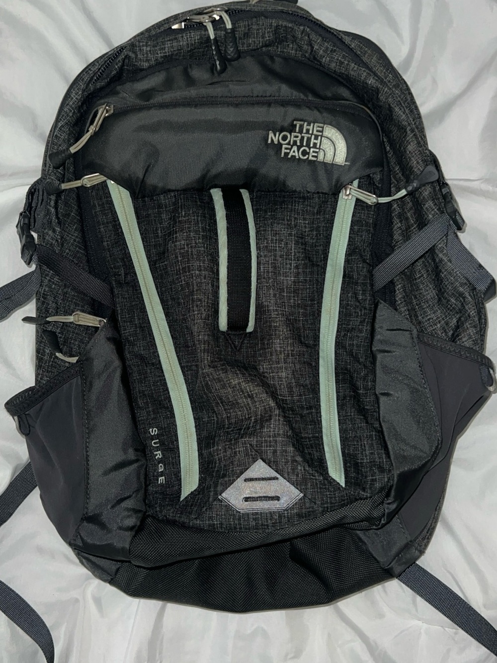 The North Face Black Backpack with Light Gray-Green Accents